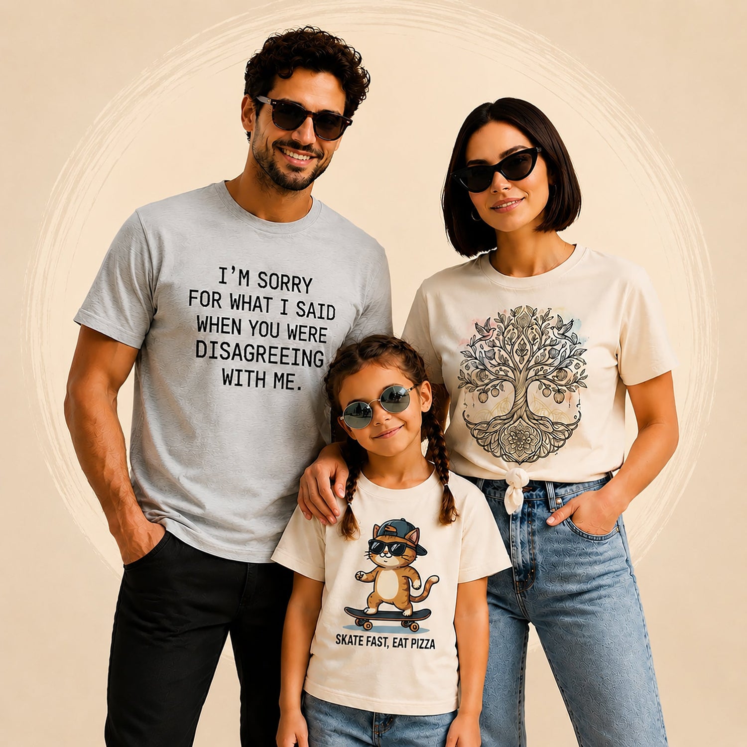 A smiling family of three wearing graphic T-shirts and sunglasses, posing in front of a beige studio-style background with a soft circular brushstroke halo.